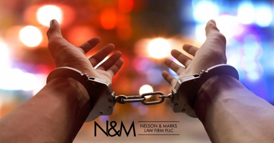 Man hands in handcuffs